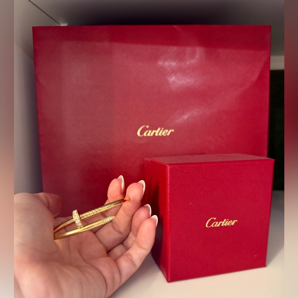 Cartier ring and juste un clou bracelet.